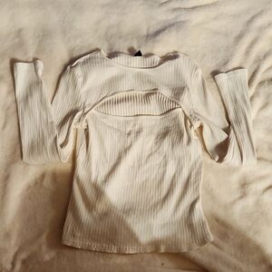 Long sleeve shirt with cleavage cutout